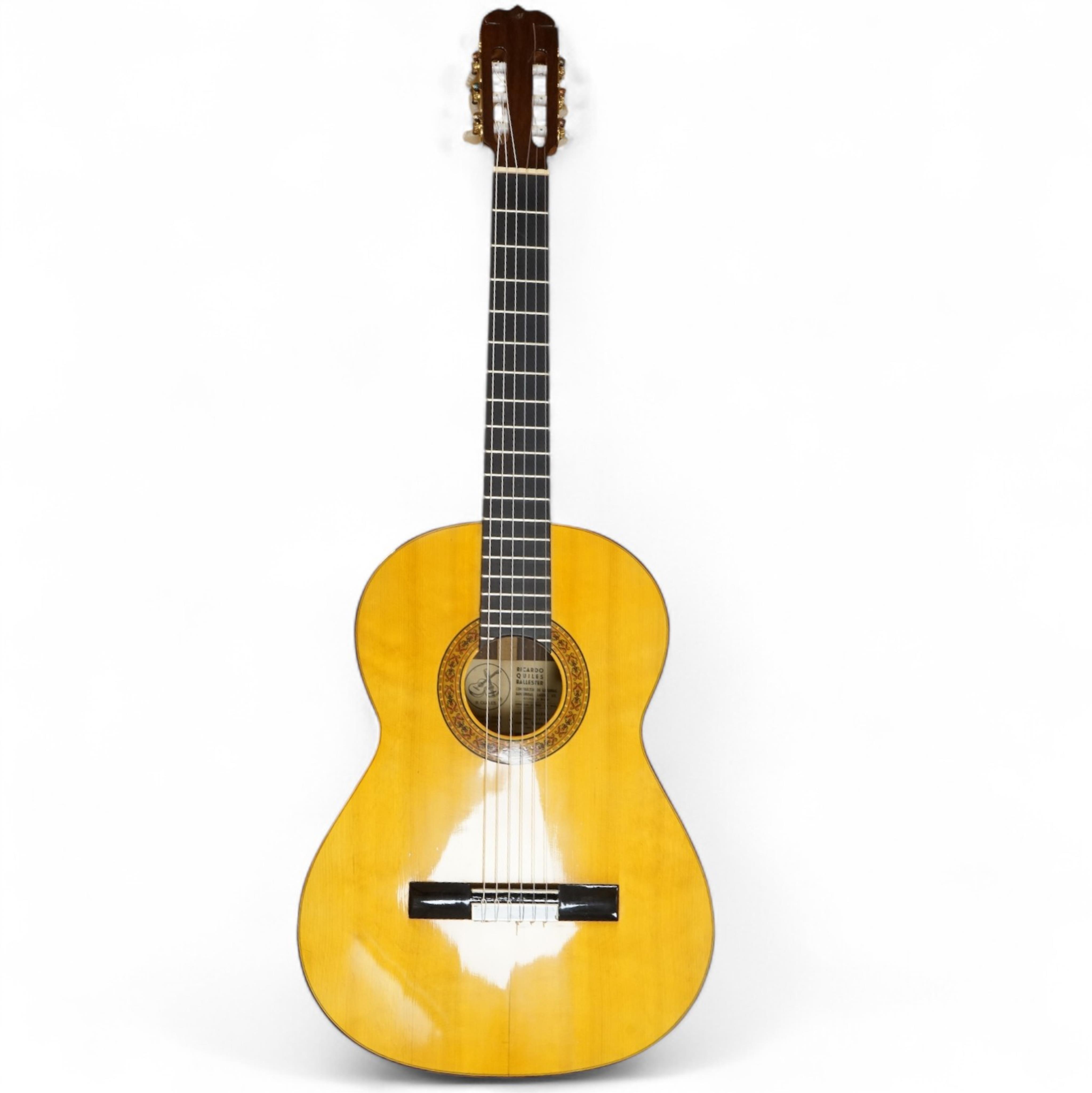 A Ricardo Quiles classical guitar, a Ramirez copy, with spruce top, Indian rosewood back and sides and ebony fingerboard.